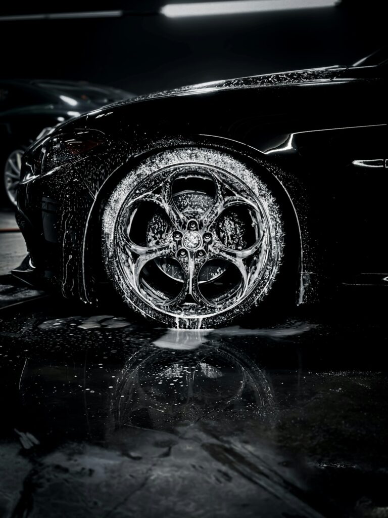 Close-up of a car tyre on a wet surface