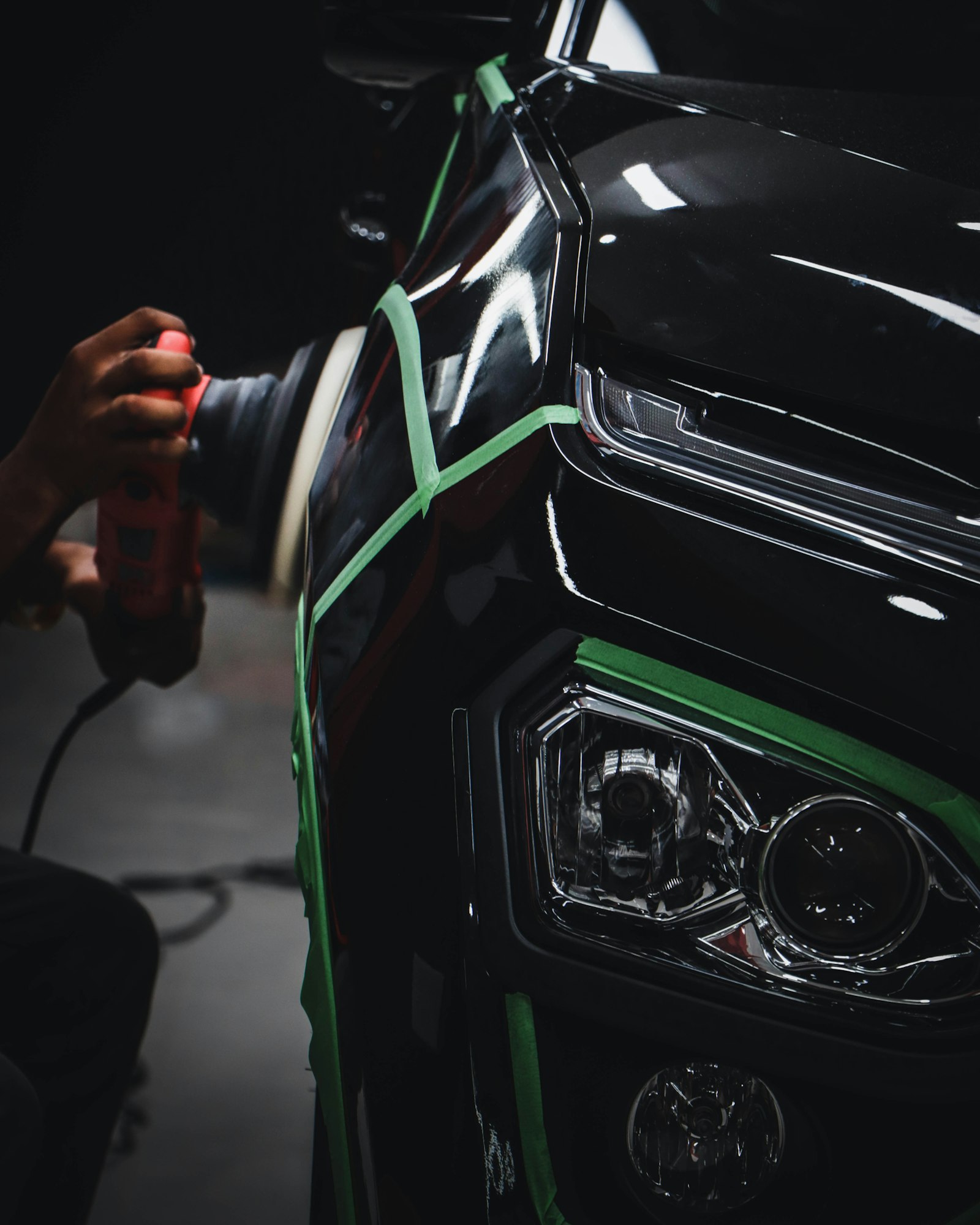 Hands on a car steering wheel inside a clean cabin